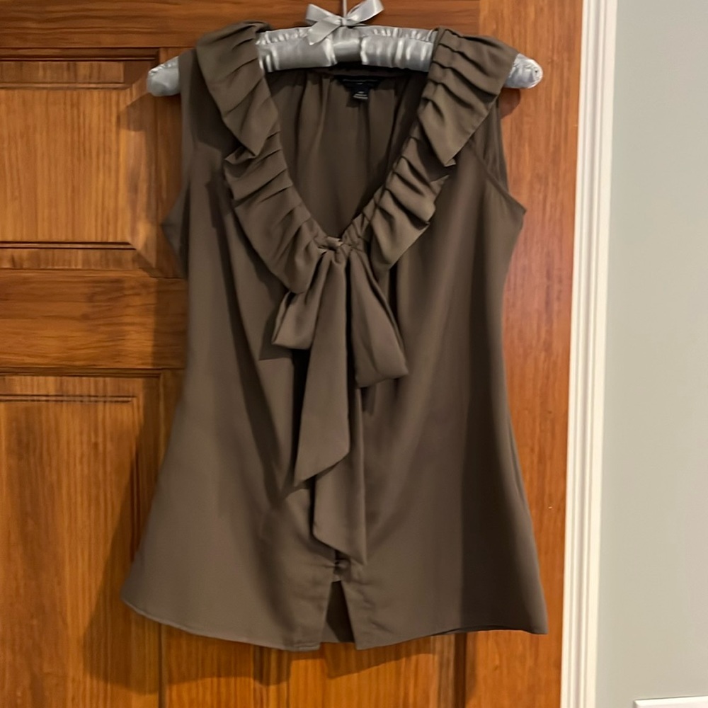 Woman’s sleeveless blouse.